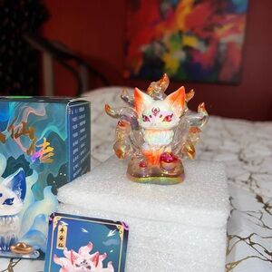 Colorful Cat Figurine with Flames